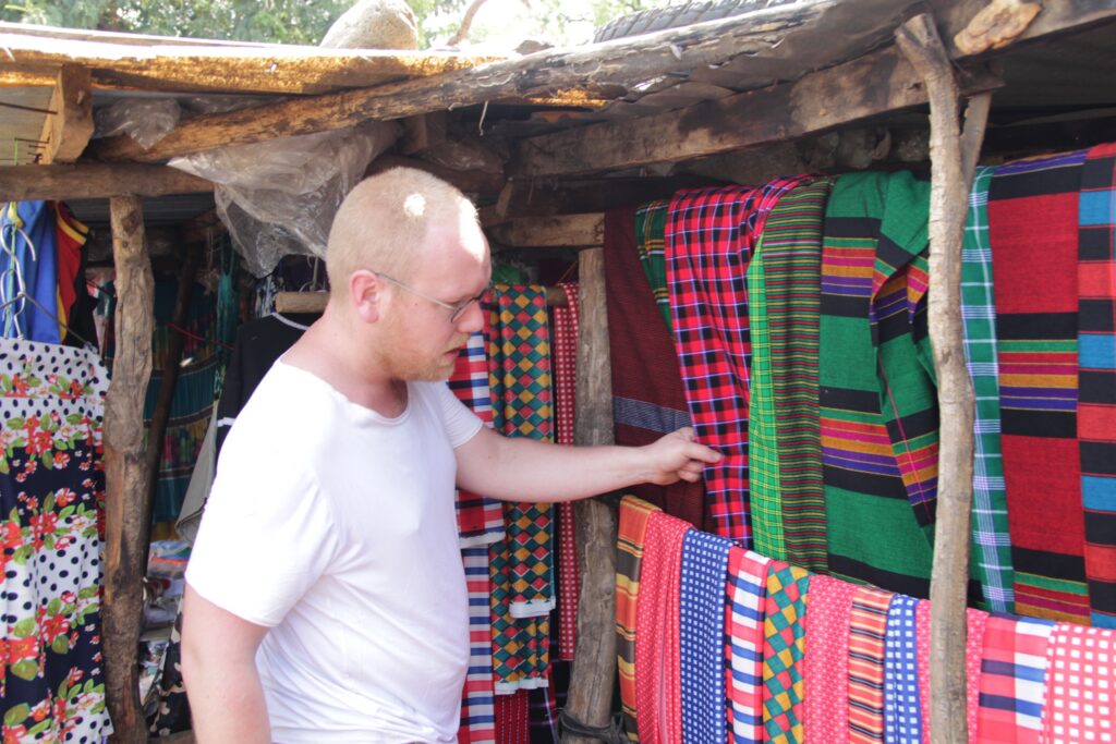 Jan Boelo visiting a local market in Karamoja Uganda to look for Shuka