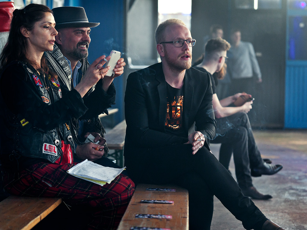 Fashion Designer Jan Boelo having a break with his choreographers at one of his fashion shows in Groningen