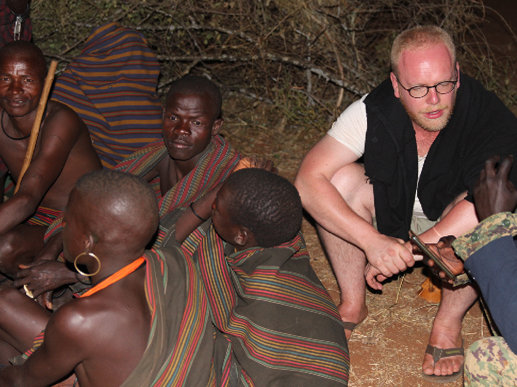 Jan Boelo Visiting a kraal in Karamoja Uganda to see how the Karamajong people live and learn about their culture